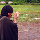 Campa Indian girl making thread